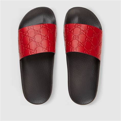 red leather gucci slides